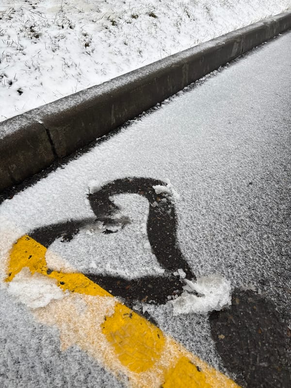 Late spring snow blankets Lupanovo amid routine delivery activities