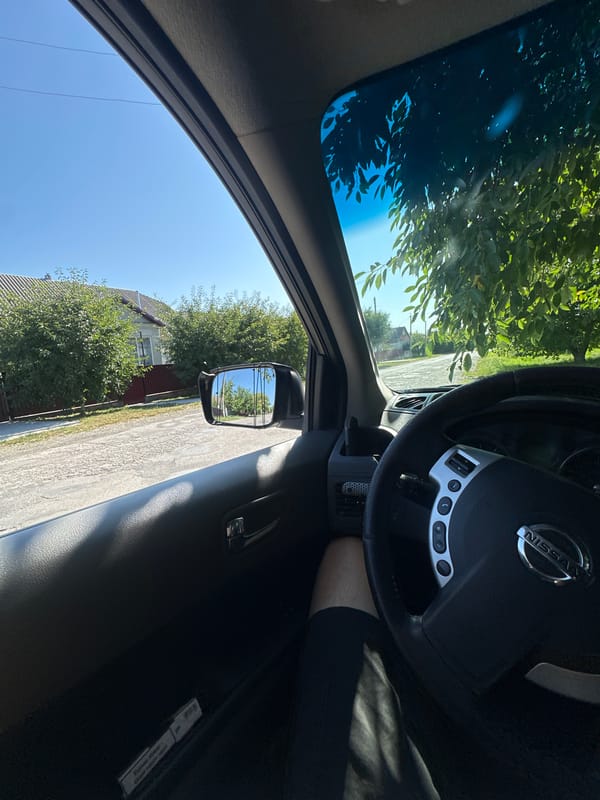 Inside a Nissan on a sunny morning in Shatava, Ukraine