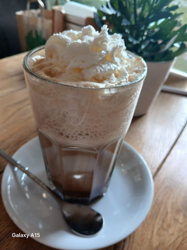 Morning café visit documented in Krakow with dessert and drinks