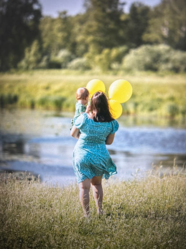 Outdoor birthday gathering in a Siberian daisy field