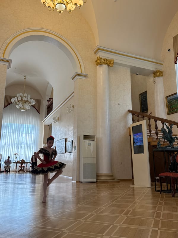 Ballet dancer performs at Sochi Winter Theater amid cultural landmarks