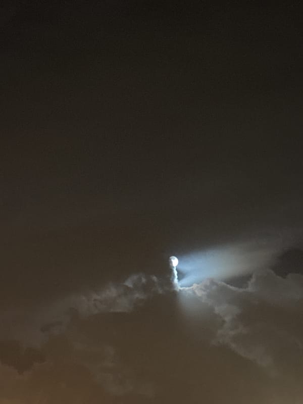 Bright circular object with trails observed in Moscow night sky