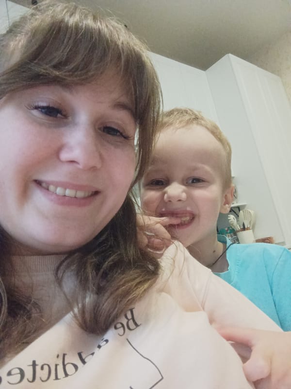 Family Takes Casual Selfies at Home in Ilskiy, Russia