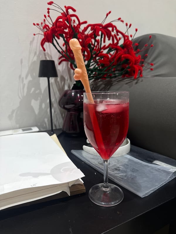 Red wine glass photographed in casual Milan home setting