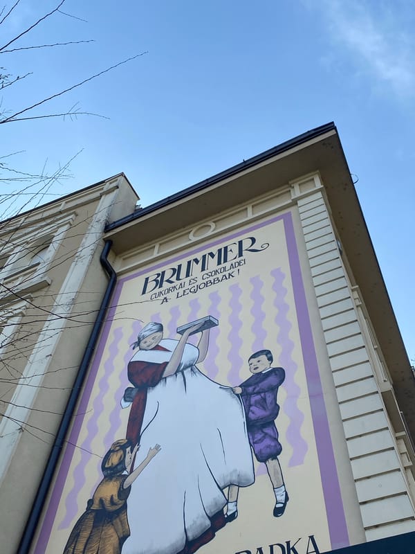Mural featuring multiple figures spotted on Subotica building