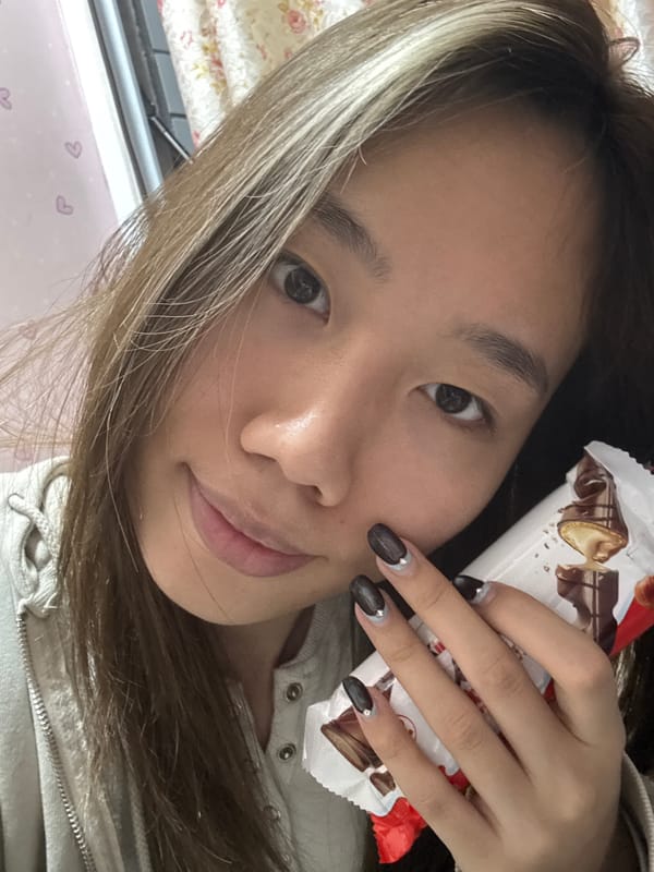 Woman takes morning selfie session in Chongqing bedroom