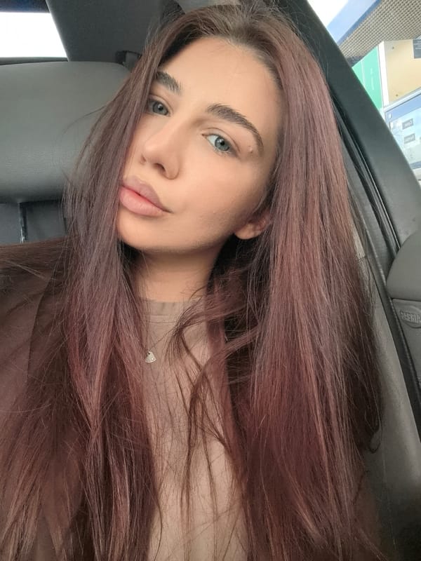 Woman takes car selfies in Stara Zagora, Bulgaria