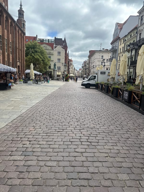 Toruń Old Town streets, architecture, and landmarks on a cloudy morning