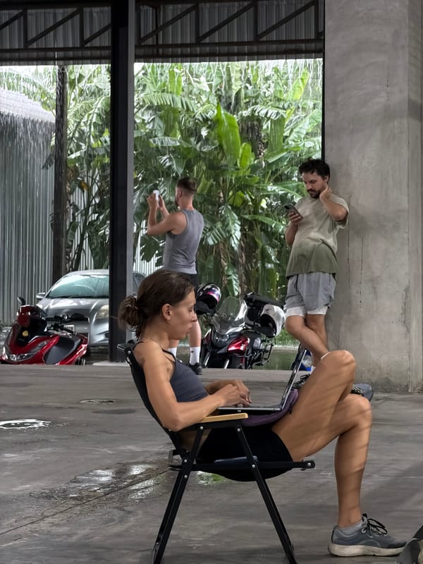 Padel match in Chiang Mai suburb as rain falls outside