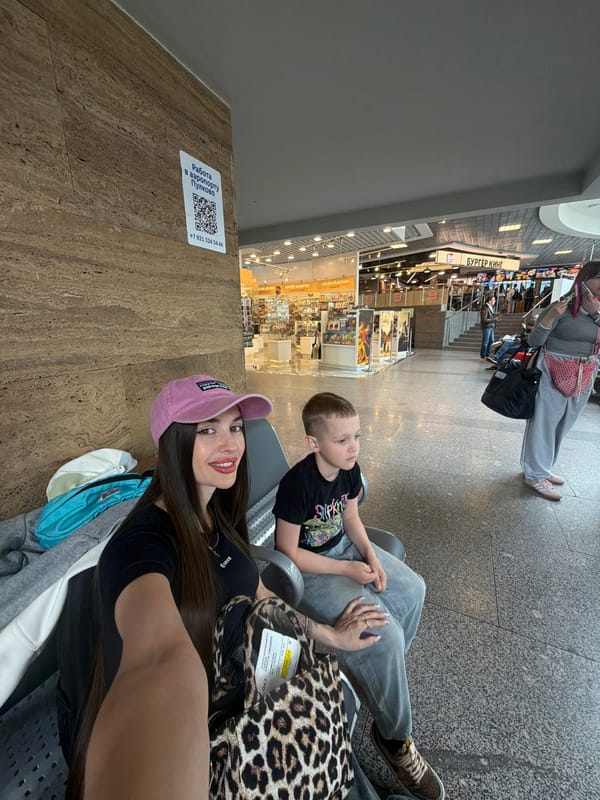 Mother and child travel through Saint Petersburg airport