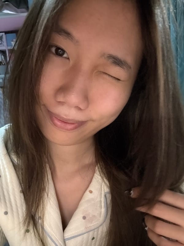 Woman takes casual selfies in pajamas at home