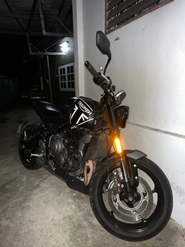 Motorcycles and convenience store browsing in Karon
