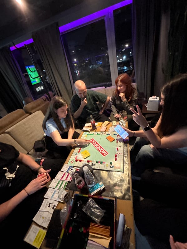 Friends gather for Monopoly and pool games at Plovdiv bar