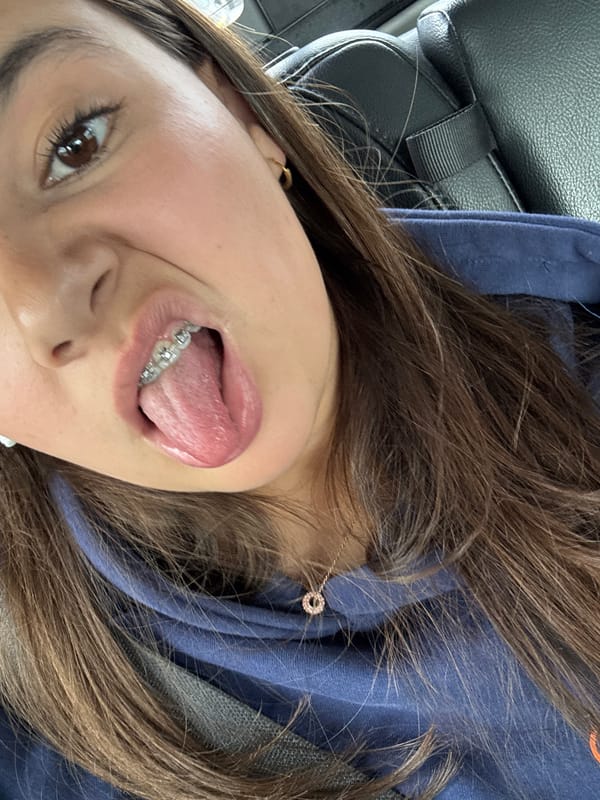 Woman takes selfie in vehicle in Austin