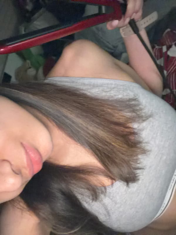 Close-up portrait captured in Sofia shows person in grey tank top