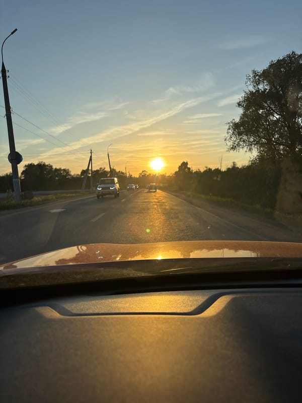 Sunset viewed from vehicle near Kabanikha, Russia