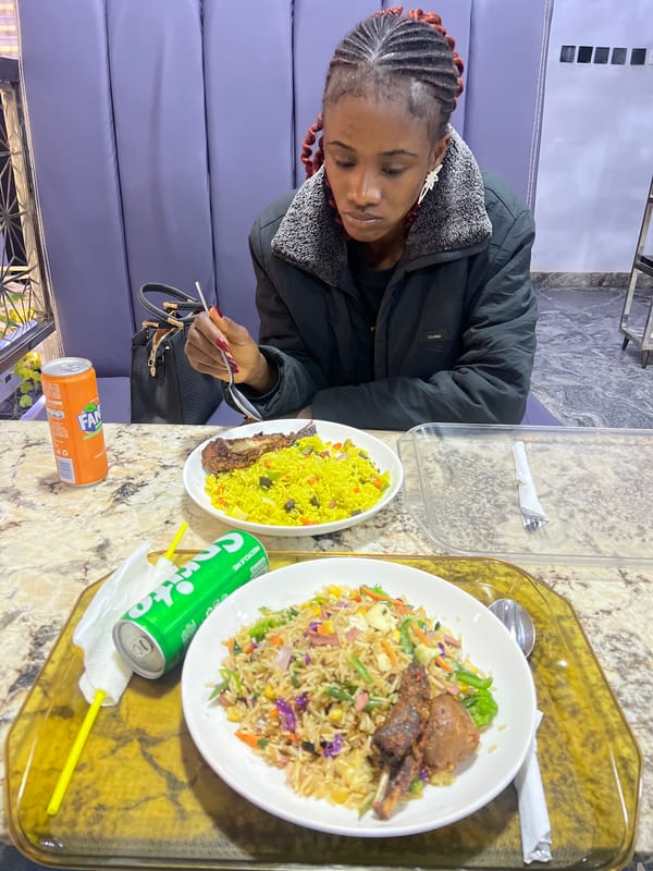 An afternoon moving through Jos: streets, food, and rain