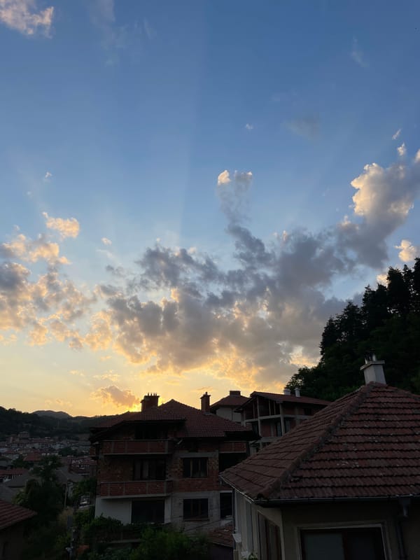 Golden-hour clouds and rooftops over Zlatograd, Bulgaria