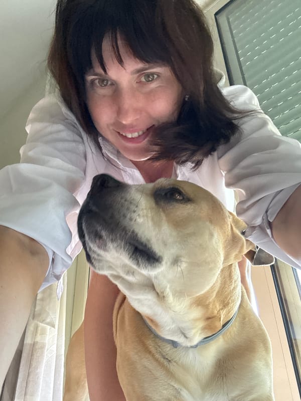 Woman dances with dog in morning moments, Aprilia