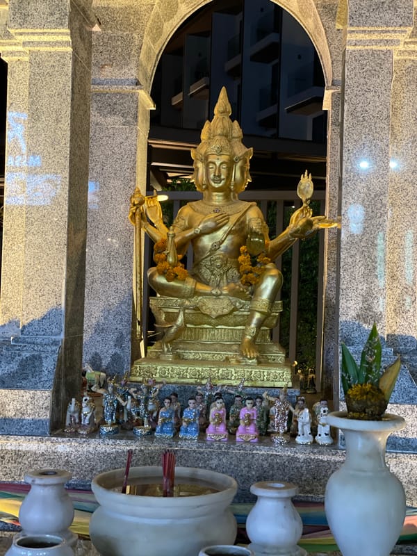 Tourist observations document Brahma shrine and nightlife in Karon, Thailand