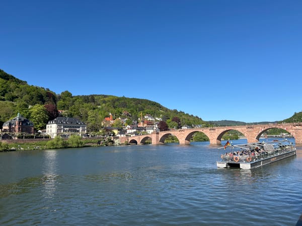 Sunny afternoon scenes documented along European riverside town