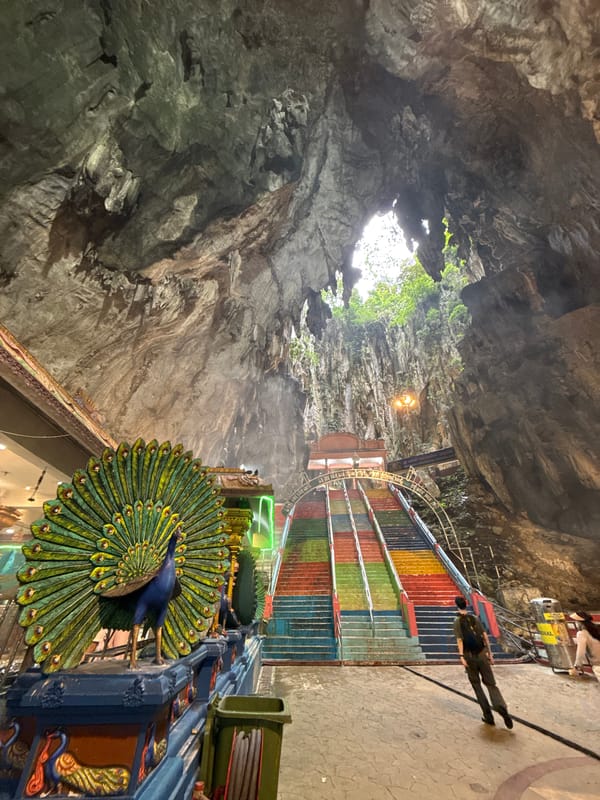 Morning visit captured at illuminated Batu Caves Temple, Malaysia