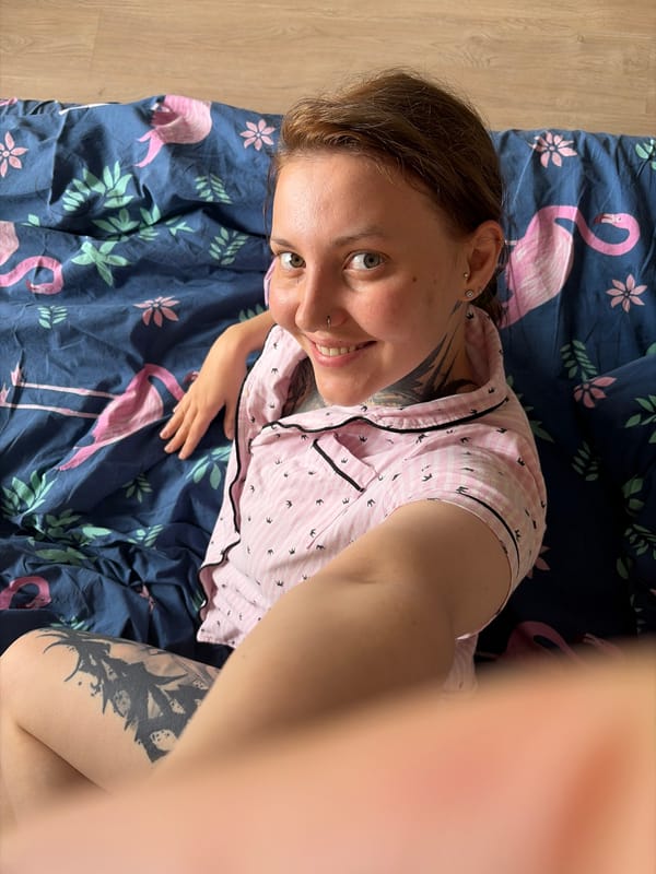 Relaxing on flamingo-print bedding in Izhevsk
