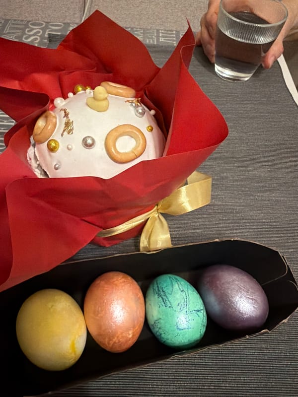 Easter celebration captured in Moscow with traditional cake and eggs