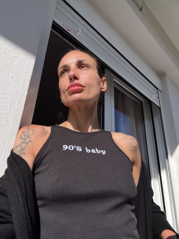 Woman enjoys morning coffee in Chania, Greece