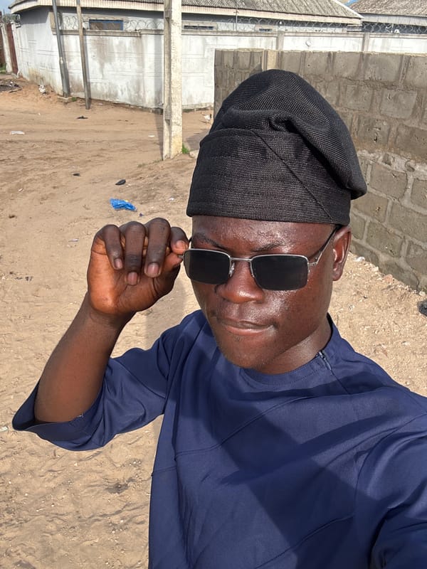Man in sunglasses photographed multiple times in Badagry, Nigeria