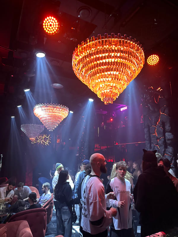 Female DJ performs at Moscow nightclub venues wearing Supreme shirt