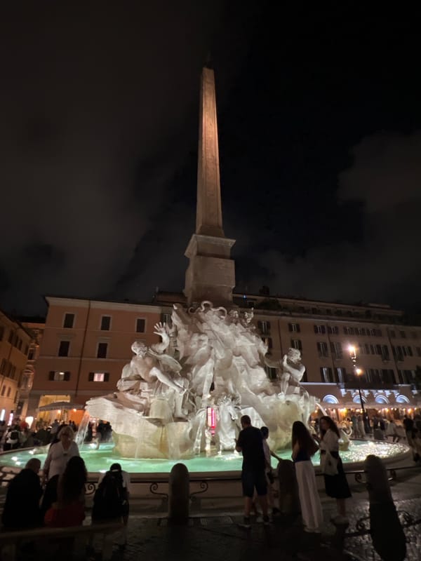 Rome's historic fountains illuminate evening squares