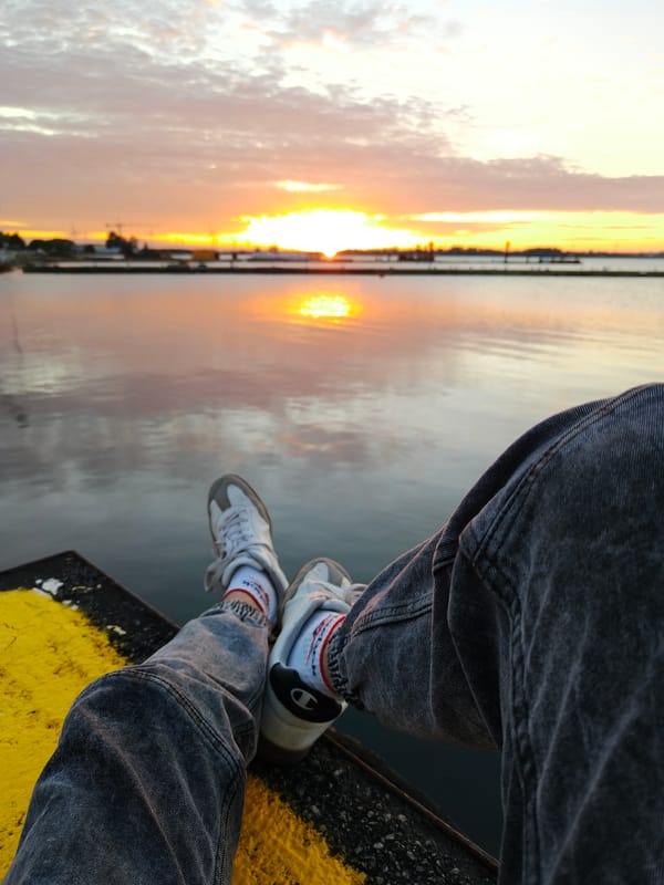 Sunset over the Bay of Puck from a quiet pier