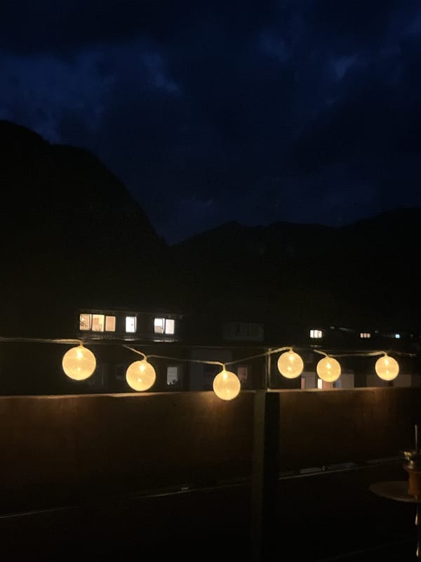 Evening balcony views with string lights in Garmisch-Partenkirchen