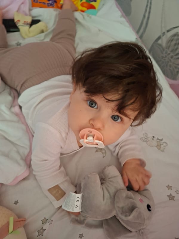Baby observed resting on blanket in Sliven, Bulgaria
