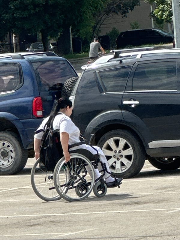 Morning scenes documented in Lovech, Bulgaria including wheelchair user
