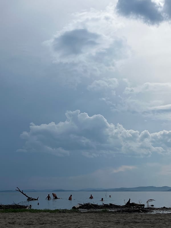 Cloudy summer morning at a lakeside beach in Krasnoturansk