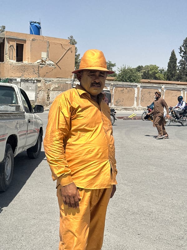 Man in orange outfit with yellow powder spotted in Quetta