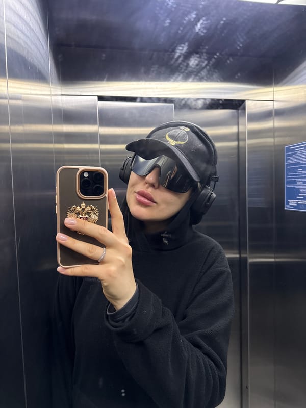 Woman takes selfie in elevator in Krasnoyarsk, Russia