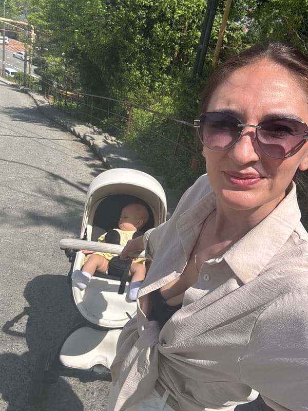 Mother enjoys outdoor moments with baby and dog in Sochi