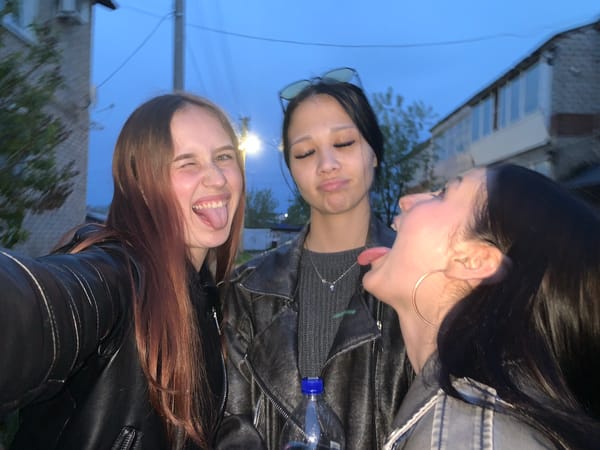 Young women pose for playful photos in Фоки, Russia