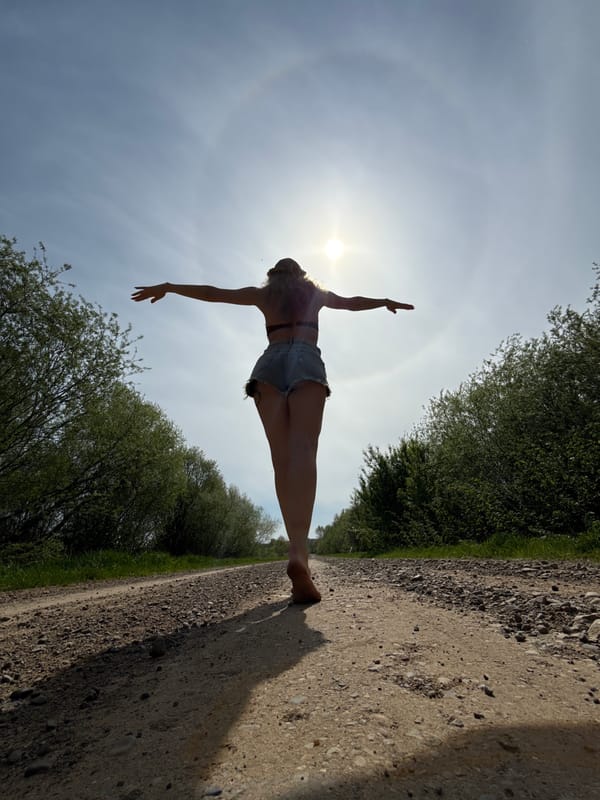 Woman poses for rural photo session in Russian countryside