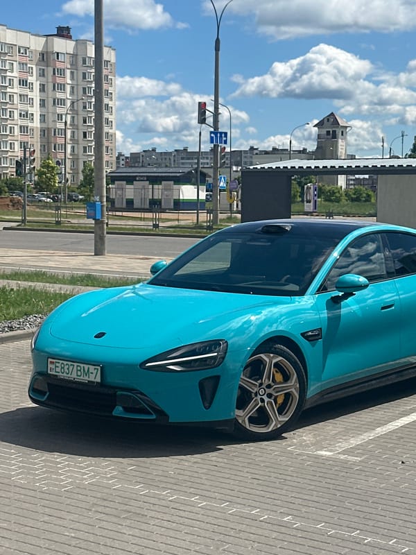 Morning documentation of vehicles and cityscape in Belarus suburb