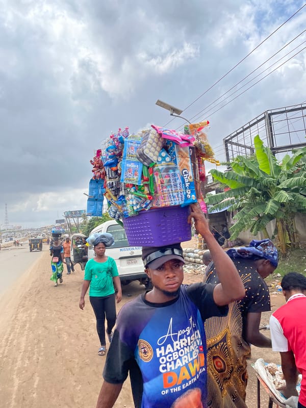 Morning market hustle in Fegge, Onitsha — vendors, street traders, produce