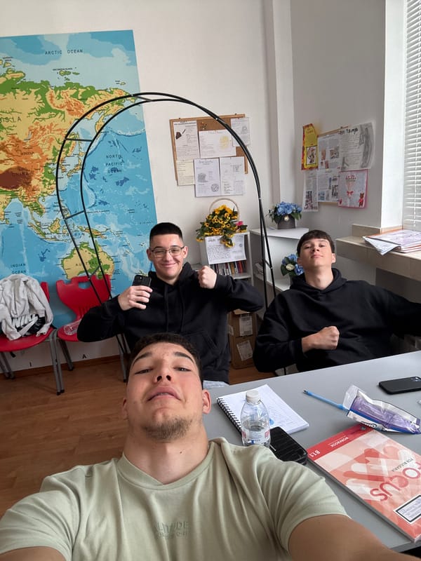 Students photograph turtle toy during classroom session in Zlatograd