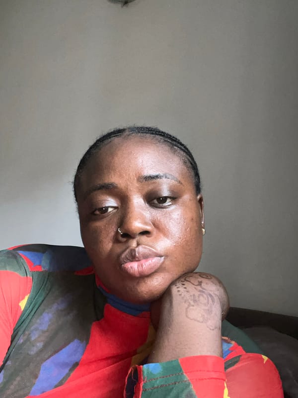 Person takes colorful selfie session in Abuja home