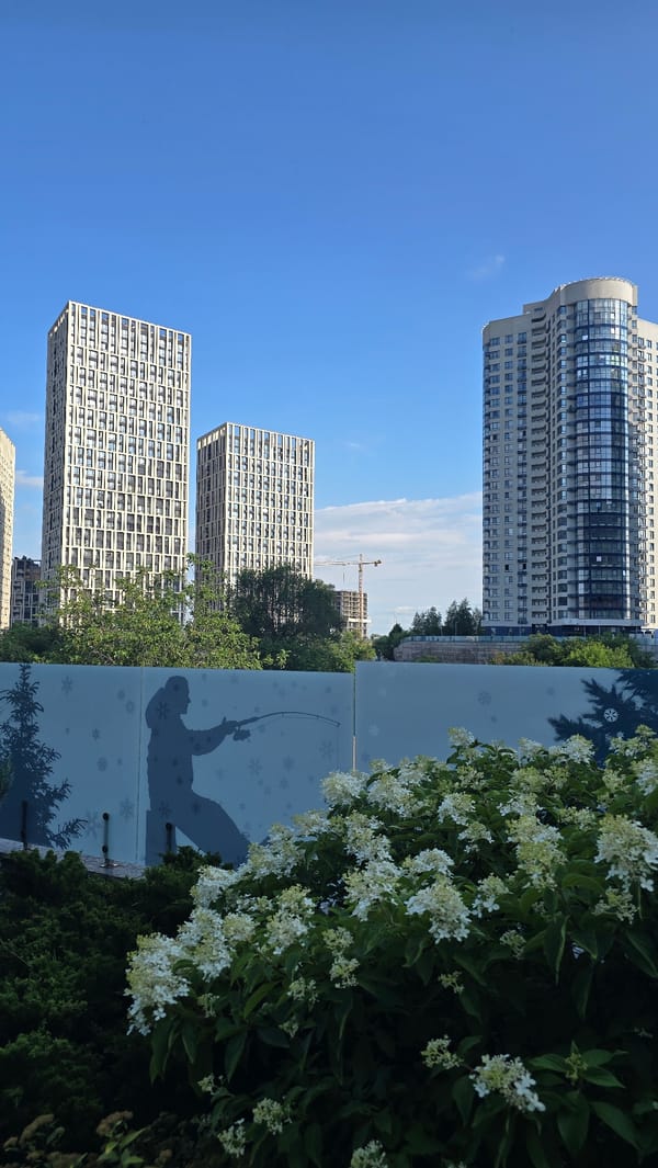 Kyiv residential complex with decorative glass fence and city views
