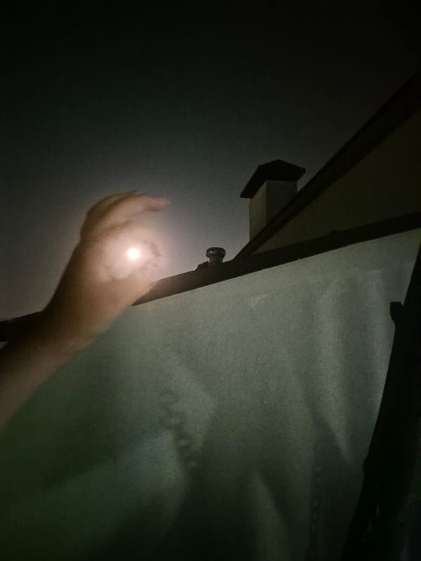 Full moon night over Chișinău rooftops, phones out