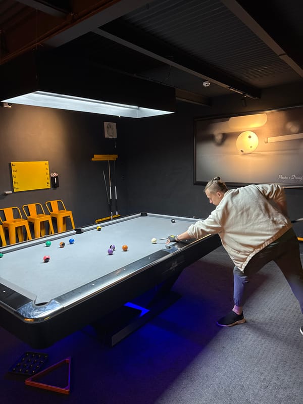 Early morning billiards game captured in Đà Lạt recreational facility