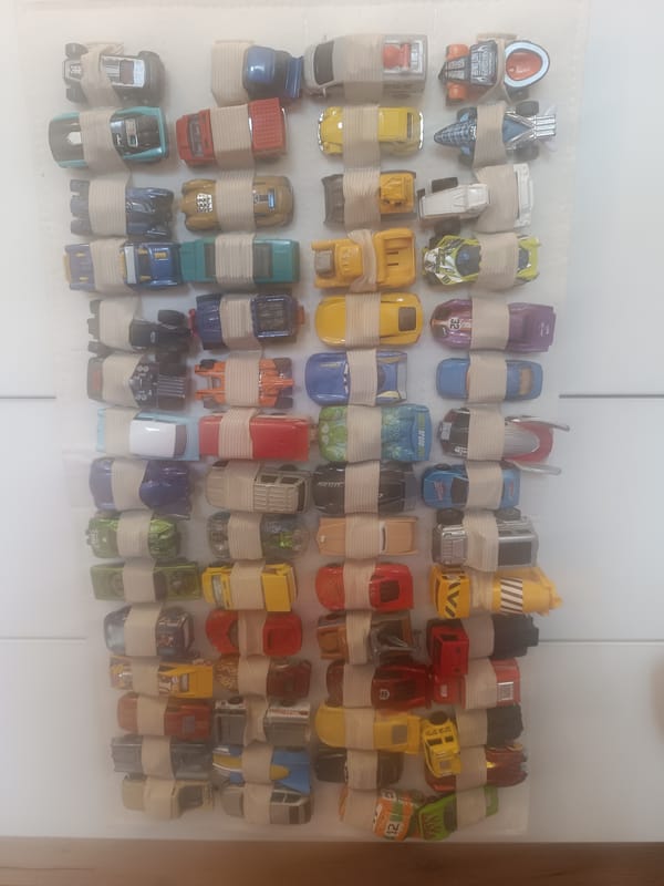 Toy cars displayed in organized grid pattern in Varna
